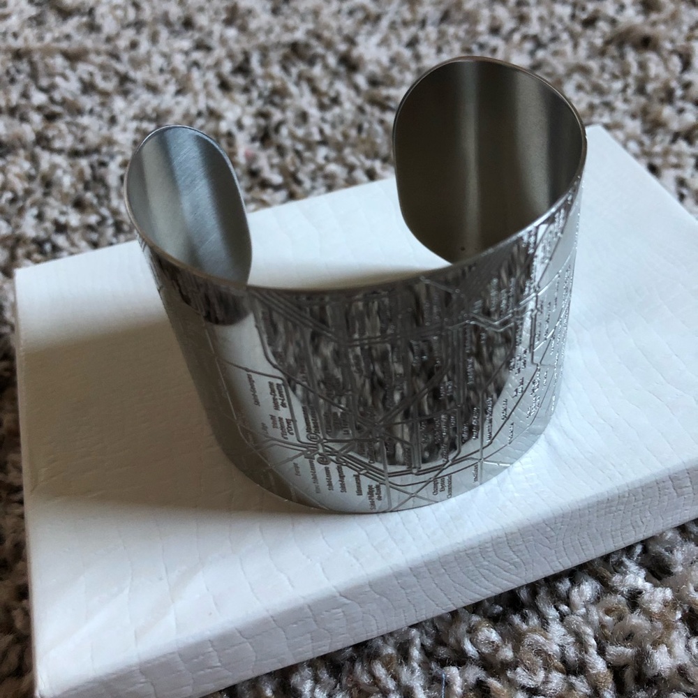 Silver cuff with Paris metro map engraving